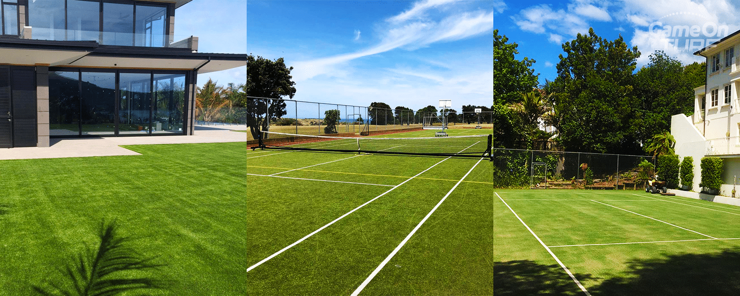 A tennis court featuring artificial grass, showcasing a vibrant green surface designed for recreational play.
